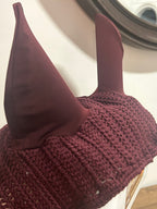 Le bonnet cheval Bubble Victoria allie élégance, confort et protection. Fait main au crochet avec point Bubble, idéal pour l'entraînement et la compétition.