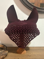 Le bonnet cheval Bubble Victoria allie élégance, confort et protection. Fait main au crochet avec point Bubble, idéal pour l'entraînement et la compétition.